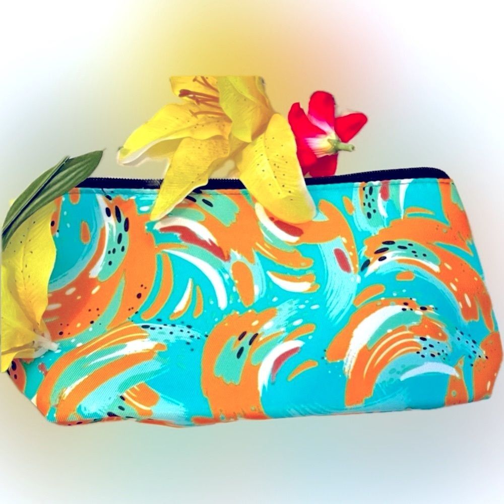 New! Never used! Clinique zip closure makeup/multi-use bag with vibrant pattern!